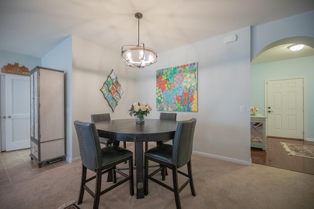 view of carpeted dining space