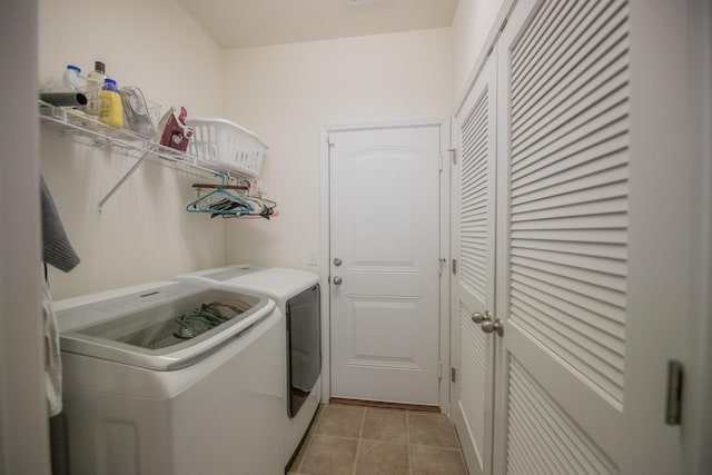 laundry room featuring washing machine and dryer