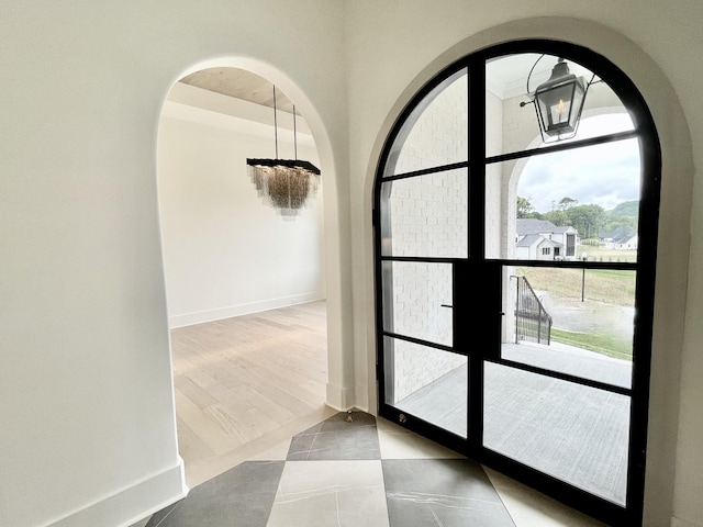 interior space with crown molding