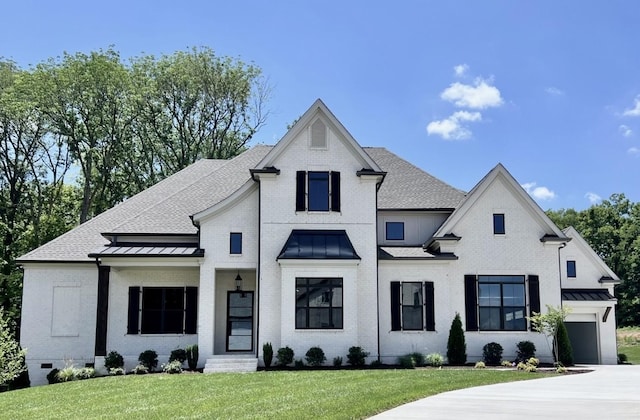 view of front of home with a front lawn