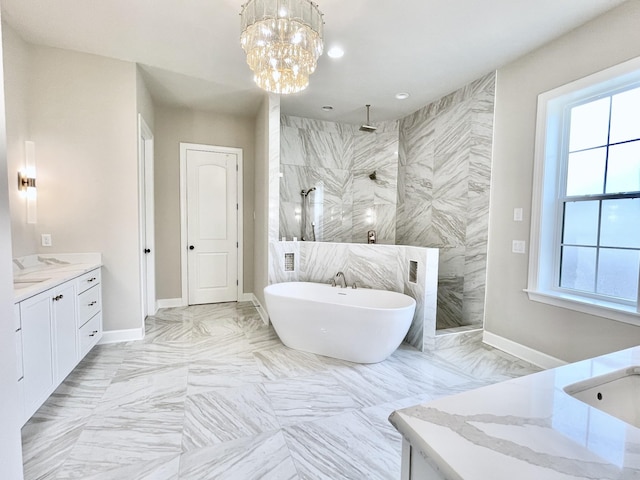 bathroom featuring vanity, a wealth of natural light, independent shower and bath, and a notable chandelier