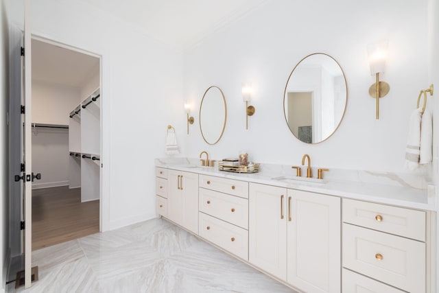 bathroom featuring vanity and crown molding