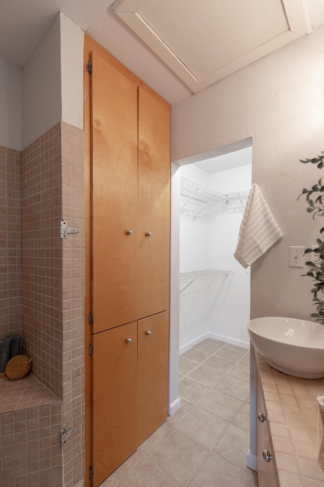 bathroom with sink and tile patterned floors