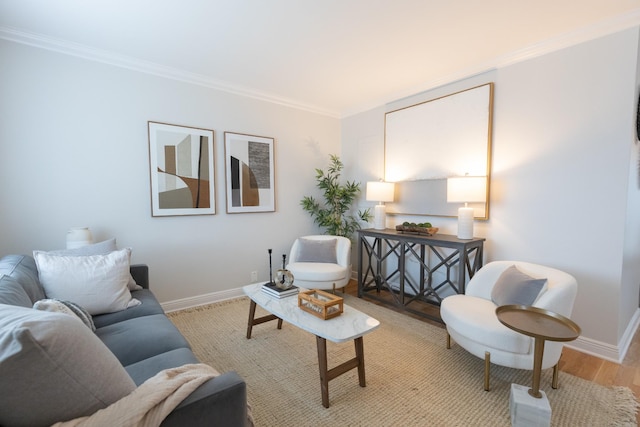 living room featuring crown molding and light hardwood / wood-style flooring