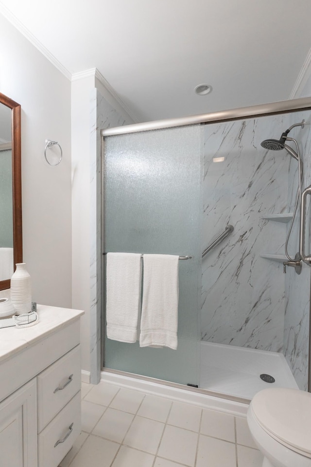 bathroom with vanity, walk in shower, crown molding, and toilet