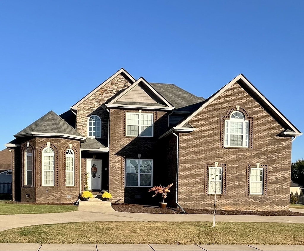 view of property with a front yard