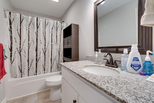 full bathroom featuring toilet, shower / bath combination with curtain, and vanity