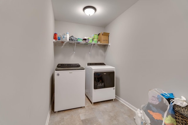 laundry room with washer and clothes dryer