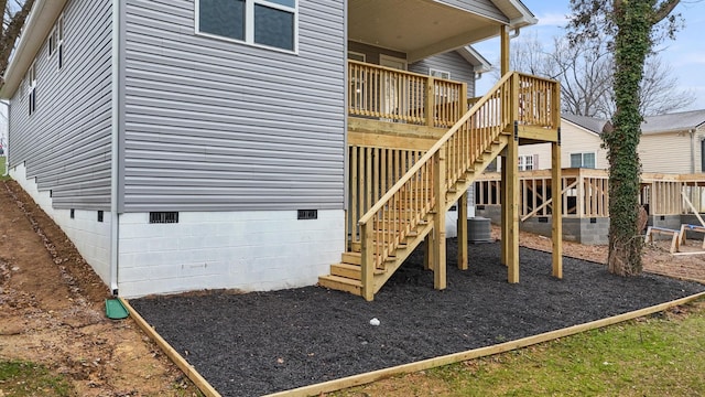 view of home's exterior with a wooden deck