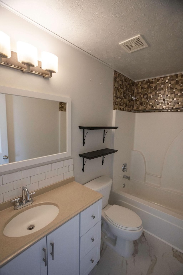 full bathroom with washtub / shower combination, toilet, a textured ceiling, vanity, and decorative backsplash