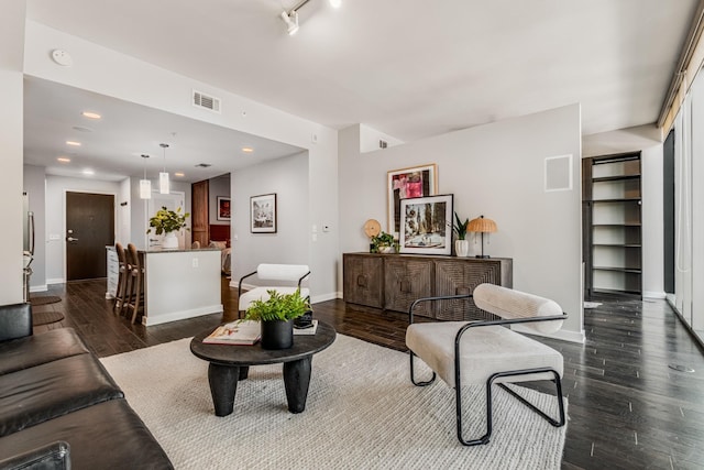 living room with dark wood-type flooring