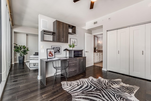 kitchen with ceiling fan, dark hardwood / wood-style floors, and dark brown cabinets