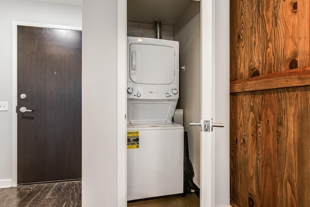 washroom with stacked washer and clothes dryer