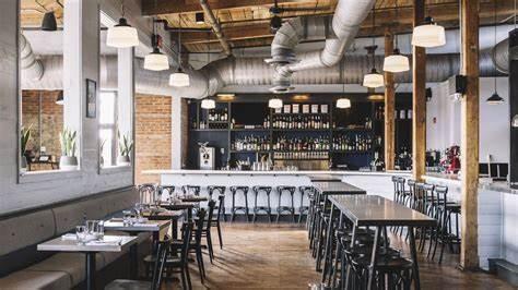 dining area featuring bar