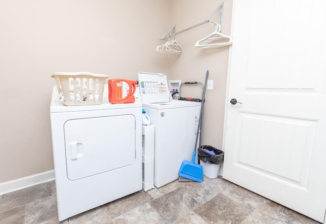 laundry area with separate washer and dryer