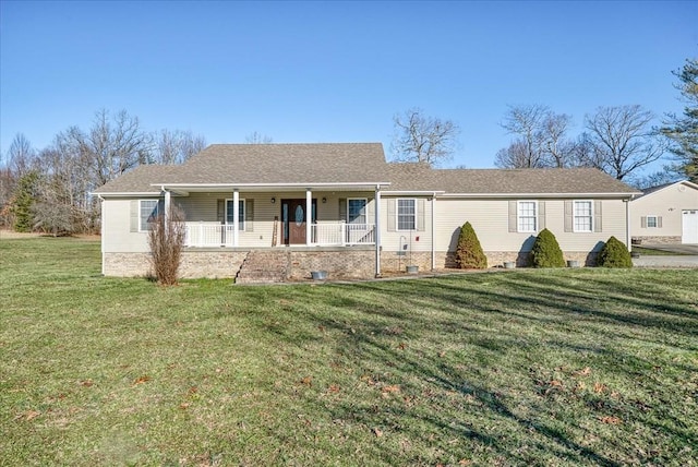 single story home featuring covered porch and a front yard