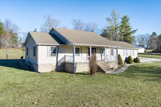 view of front of house with a front yard and a porch