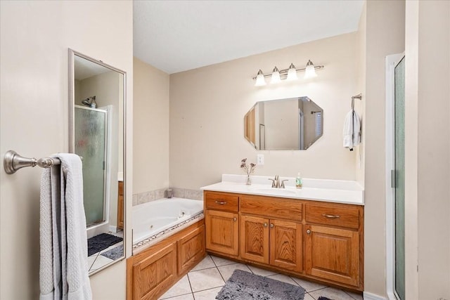 bathroom featuring vanity, shower with separate bathtub, and tile patterned floors