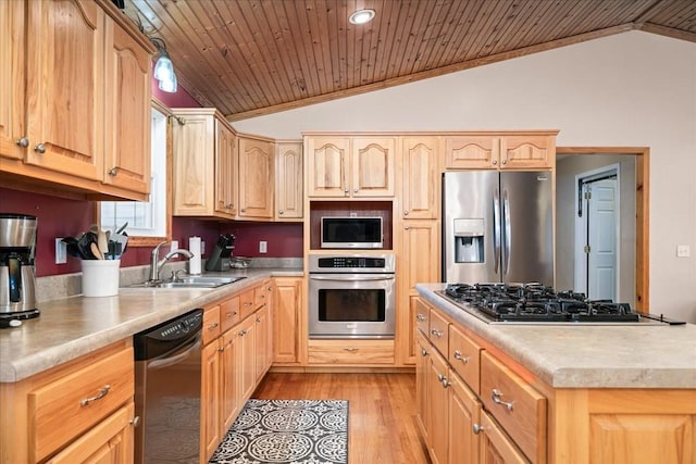 kitchen with wood ceiling, vaulted ceiling, appliances with stainless steel finishes, and sink