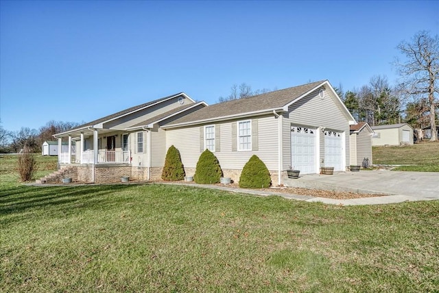 single story home with covered porch, a front yard, and a garage