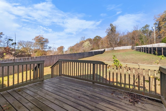 deck featuring a lawn