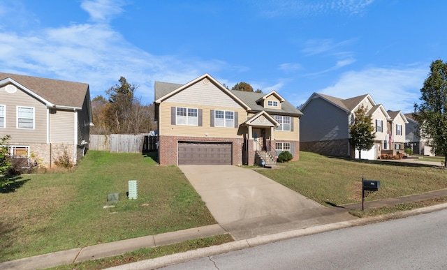 view of front facade featuring a garage and a front lawn