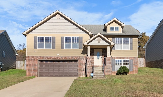 view of front of property with a garage and a front yard