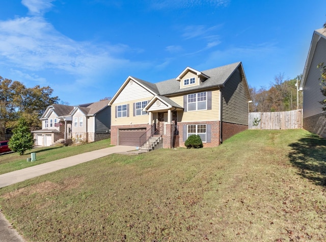 view of front of home with a garage and a front lawn