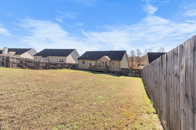 view of yard featuring a wooden deck