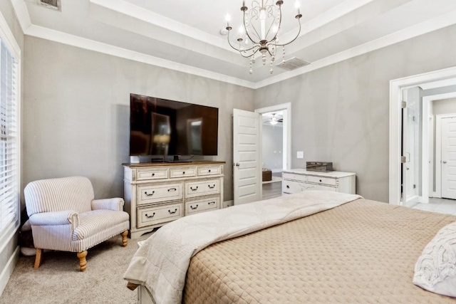 carpeted bedroom featuring crown molding, a raised ceiling, and a notable chandelier