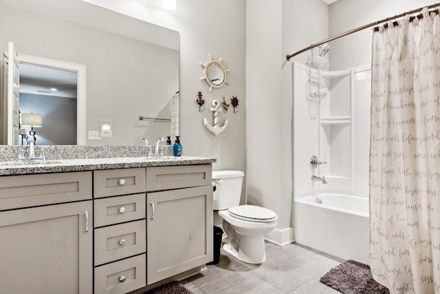 full bathroom featuring tile patterned floors, toilet, vanity, and shower / tub combo with curtain