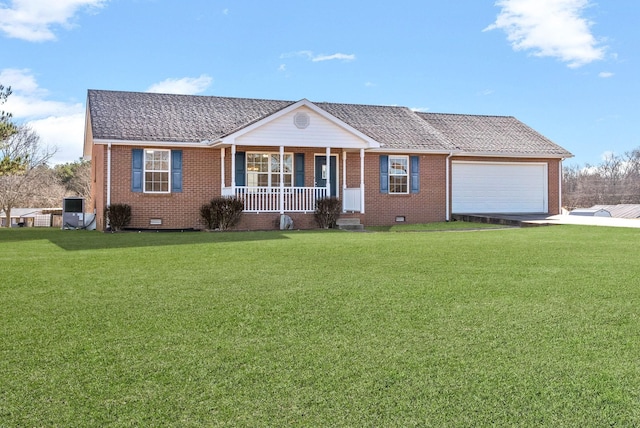 ranch-style house featuring a garage, a front yard, and a porch