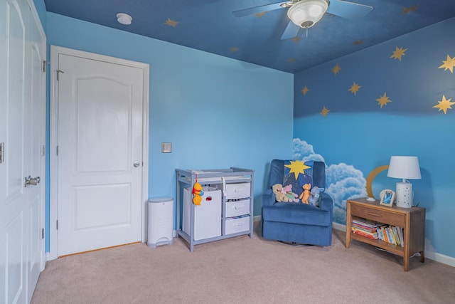 game room featuring carpet floors and ceiling fan