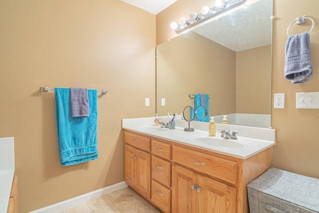 bathroom with vanity and tile patterned floors