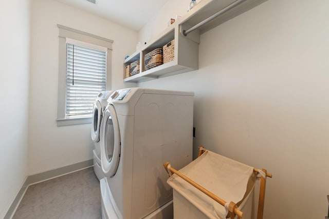 laundry room featuring washing machine and dryer