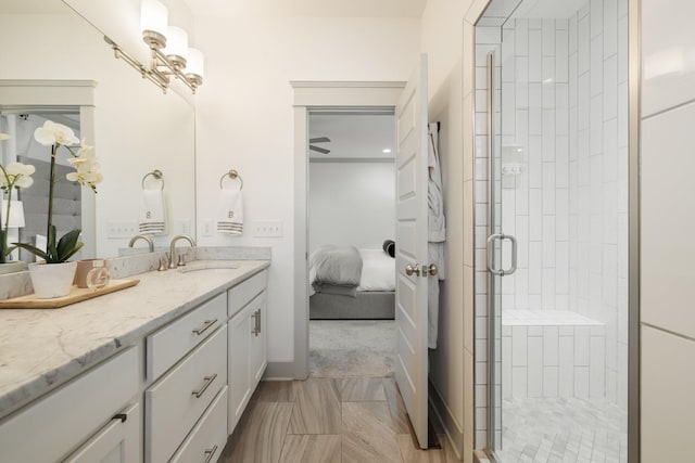 bathroom with vanity and walk in shower