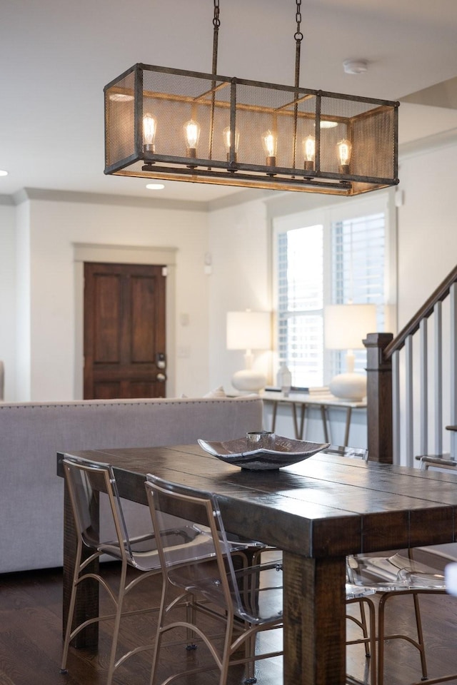 dining area featuring dark hardwood / wood-style floors