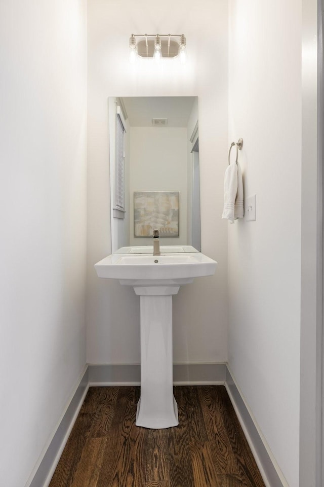 bathroom featuring hardwood / wood-style flooring