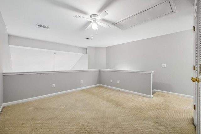 carpeted empty room with ceiling fan