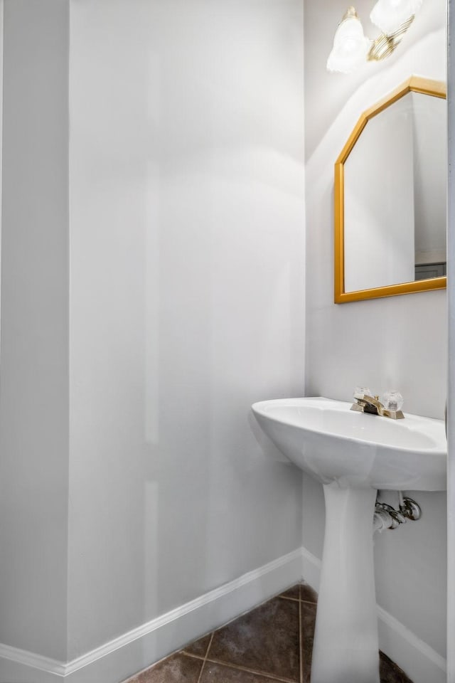 bathroom featuring sink and tile patterned flooring