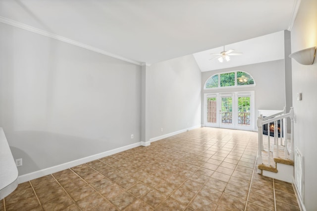 unfurnished living room with ceiling fan, light tile patterned floors, and vaulted ceiling