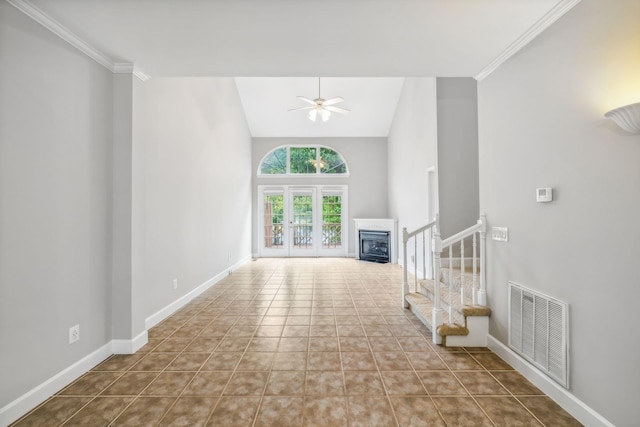 unfurnished living room featuring high vaulted ceiling, light tile patterned floors, ceiling fan, and ornamental molding