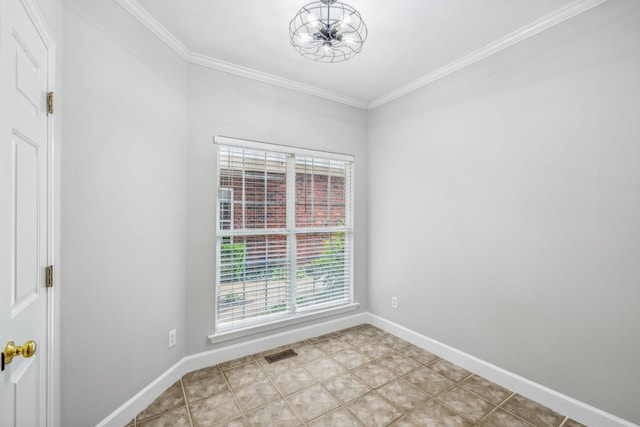 unfurnished room with crown molding and plenty of natural light