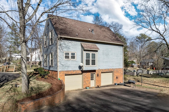 view of home's exterior with a garage