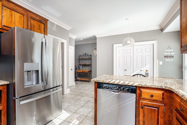 kitchen with pendant lighting, appliances with stainless steel finishes, light stone counters, ornamental molding, and light tile patterned flooring