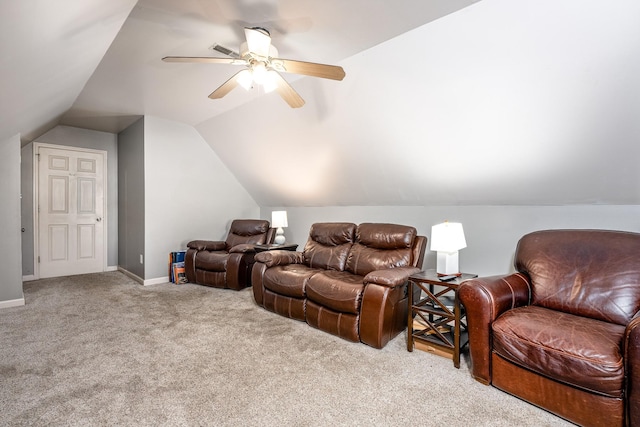 cinema with ceiling fan, light colored carpet, and lofted ceiling