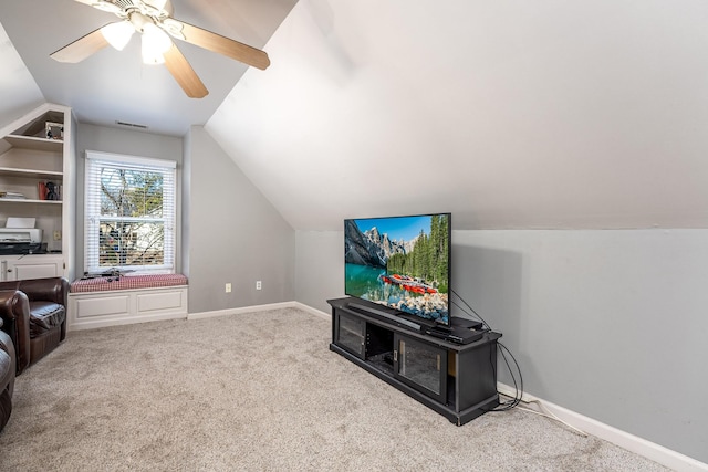 interior space with ceiling fan and lofted ceiling