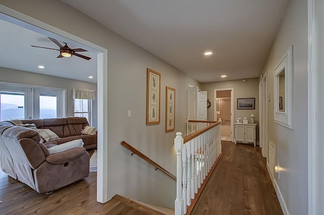 hall with dark hardwood / wood-style floors