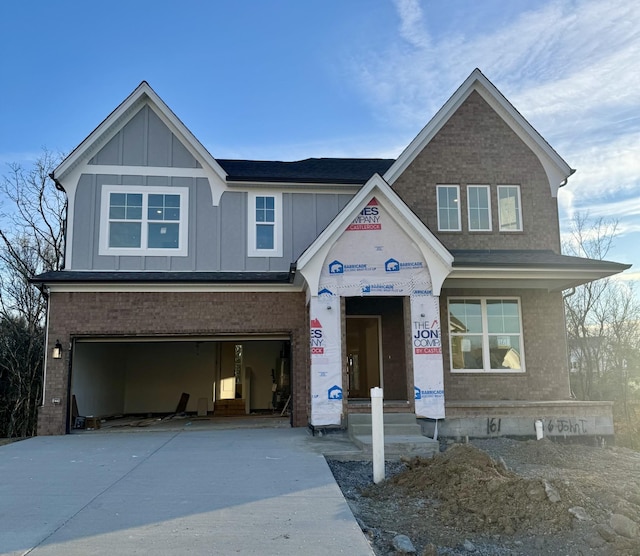 view of front of property with a garage