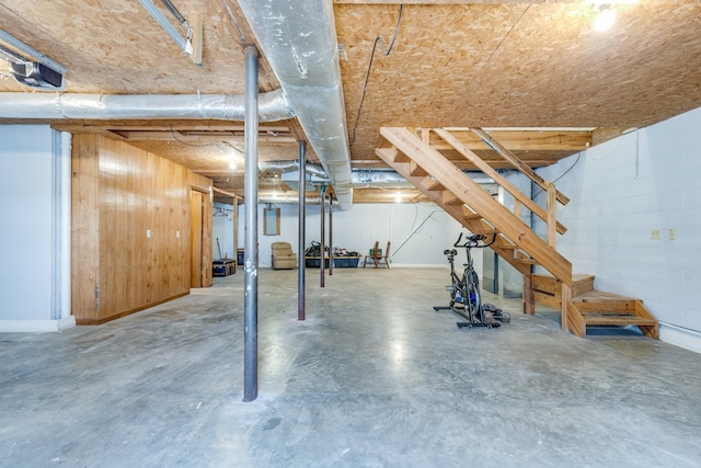 basement with wood walls